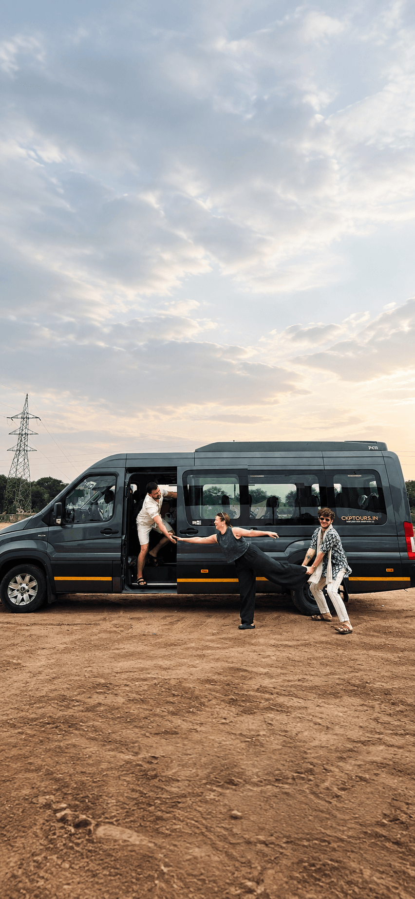 Force Urbania van with a group of travellers at sunset in Rajasthan